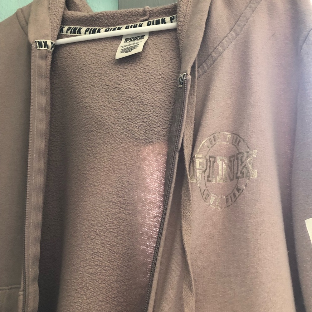 A pink (brand) jacket.